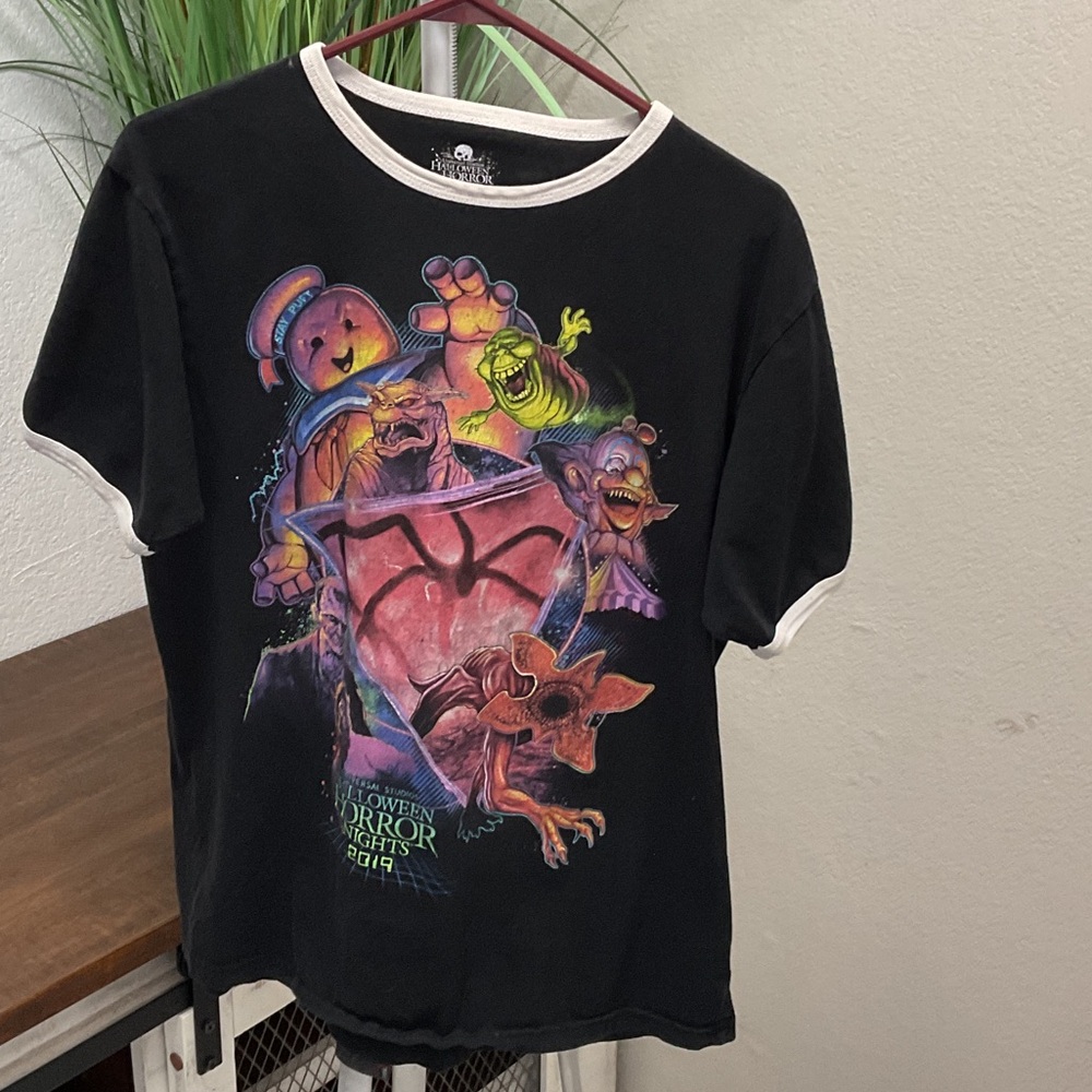 Universal Black Tee with Colorful Monster Print